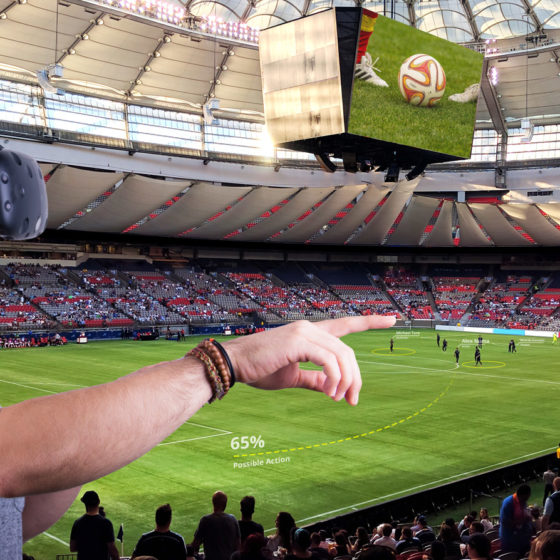 man watching soccer game in virtual reality