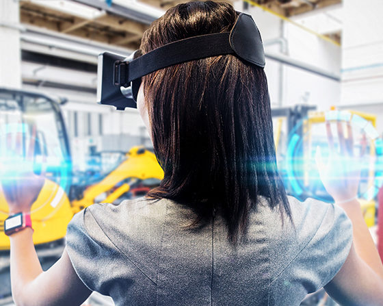 Young woman using VR Headset for job training in warehouse