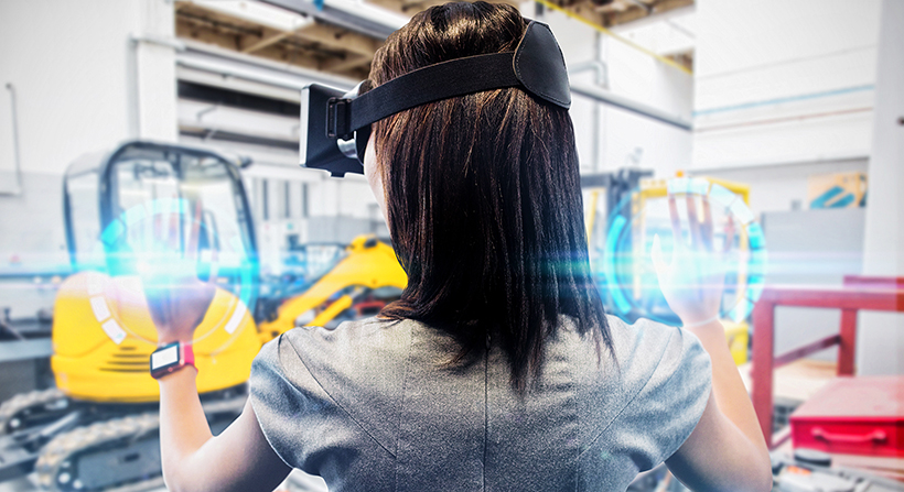 Young woman using VR Headset for job training in warehouse