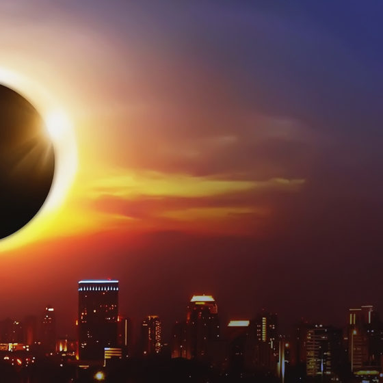 Total Solar Eclipse over a city view