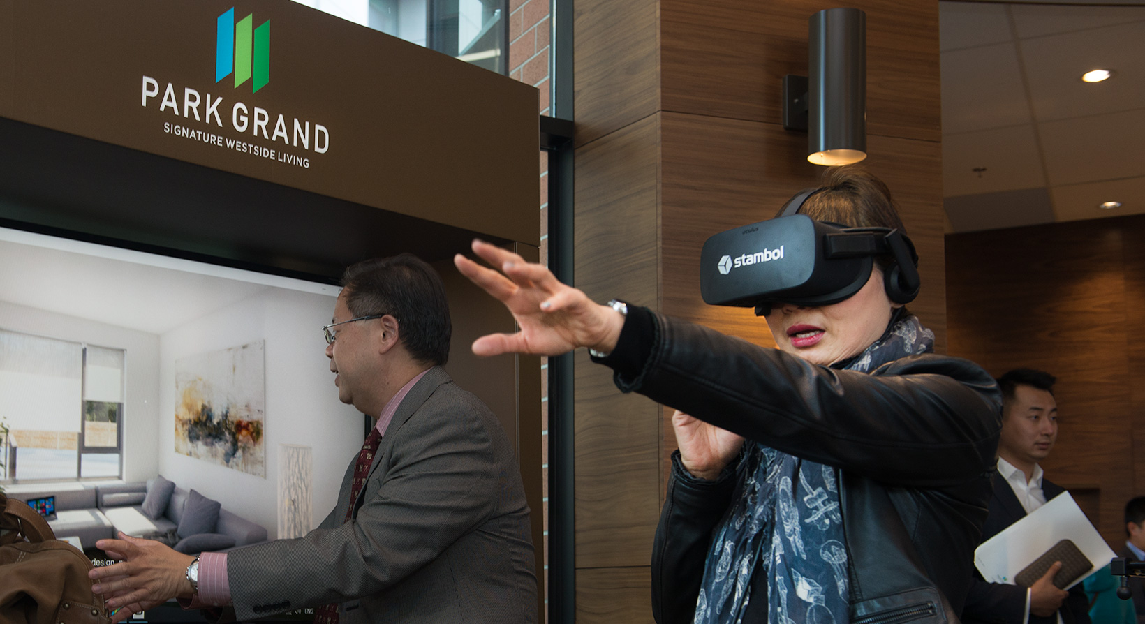 woman trying Park Grand for real estate in virtual reality by Stambol Studios