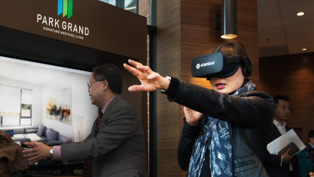 woman trying Park Grand for real estate in virtual reality by Stambol Studios
