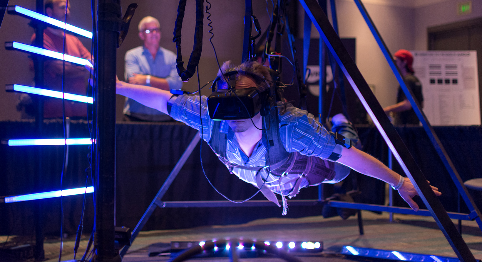 Guy in an immersive experience with VR headset in VRLA Expo Event