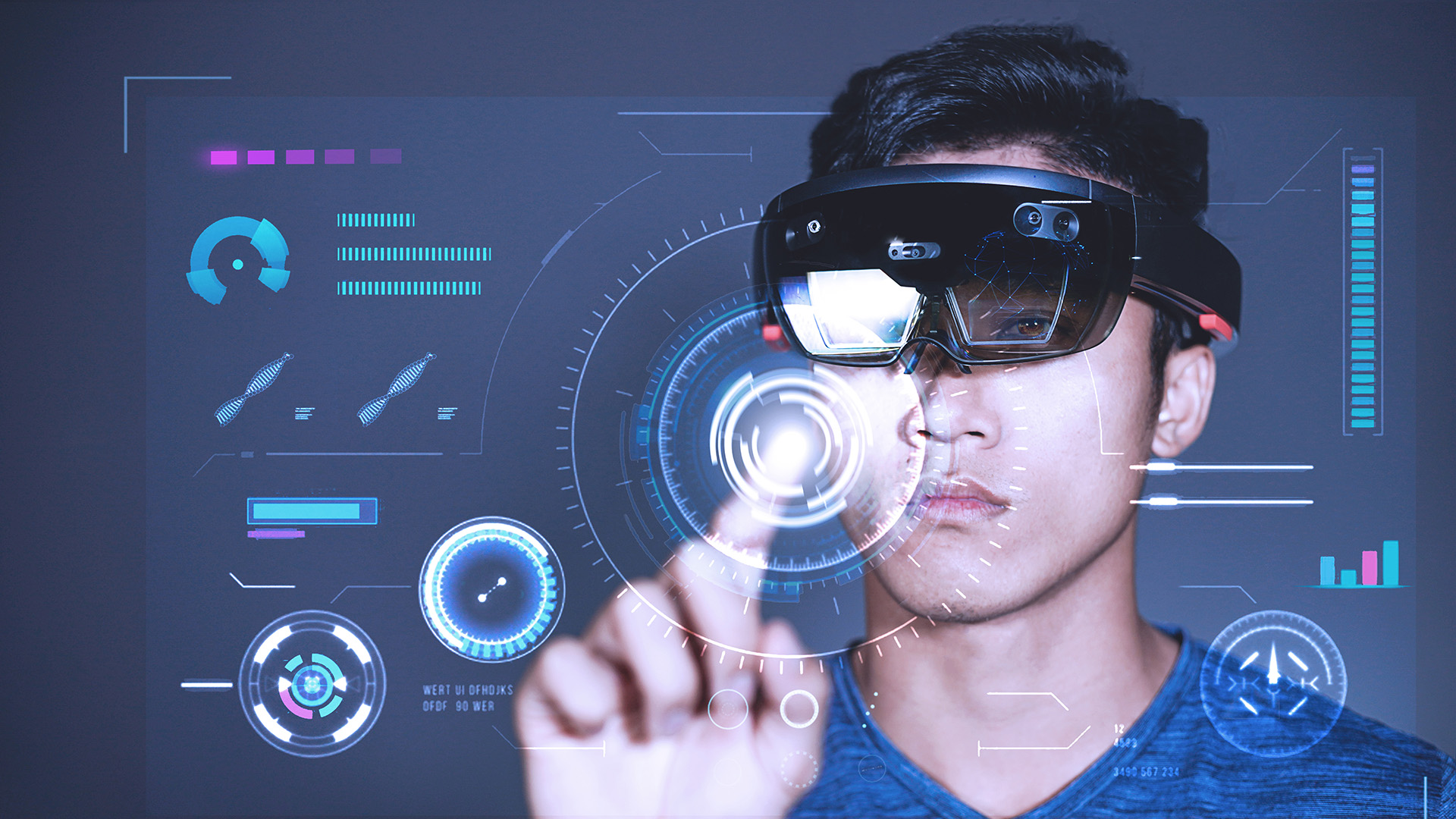 Young Man wearing Hololens pressing virtual buttons on business charts