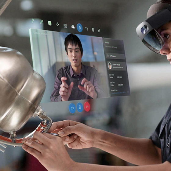engineer using microsoft hololens for virtual training through remote assist