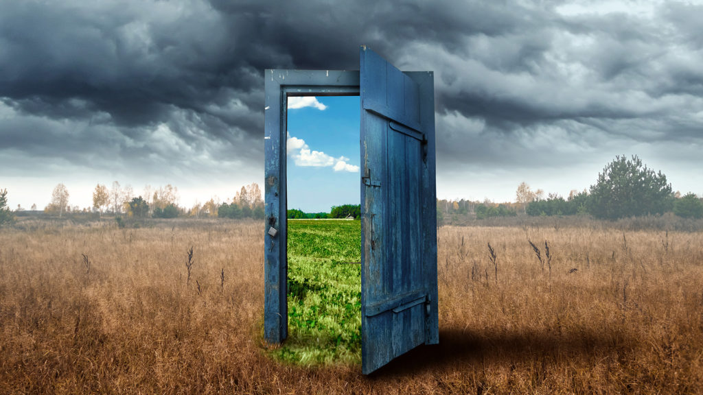 old wooden door portal shows a bright future to indicate the breakthrough value of business transformation