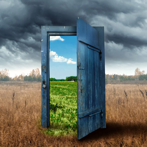 old wooden door portal shows a bright future to indicate the breakthrough value of business transformation