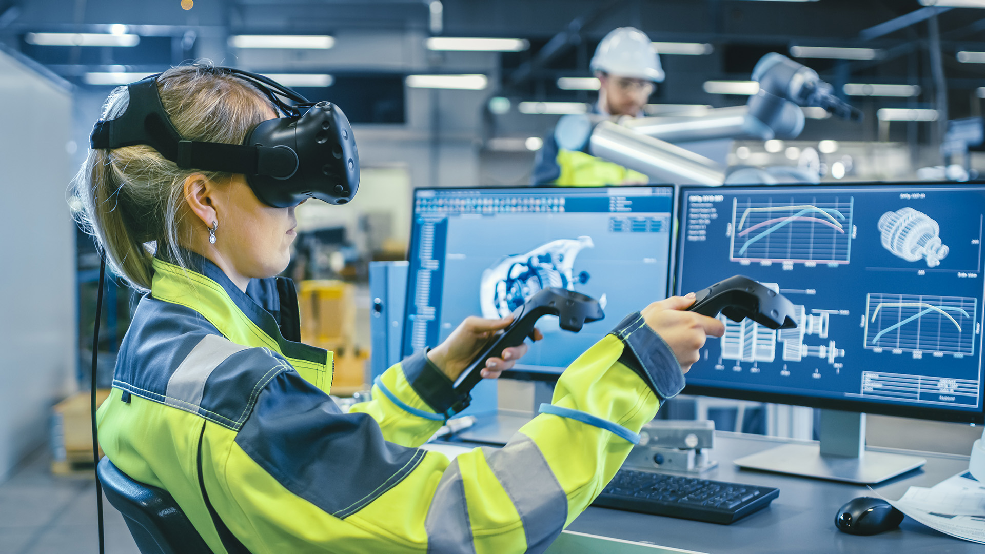 female factory worker wearing a vr headset and holding controllers for an industrial training application in an enterprise setting